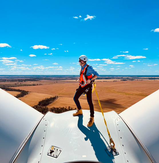 Octopus Managing Director Sam Reynolds enjoying the view from the top of one of Octopus' wind turbines. 