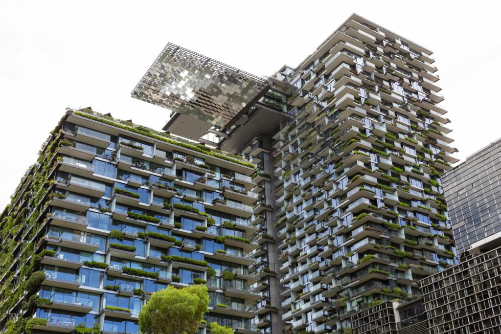Apartment buildings with bio-wall and heliostat with motorised mirrors in Sydney Australia.