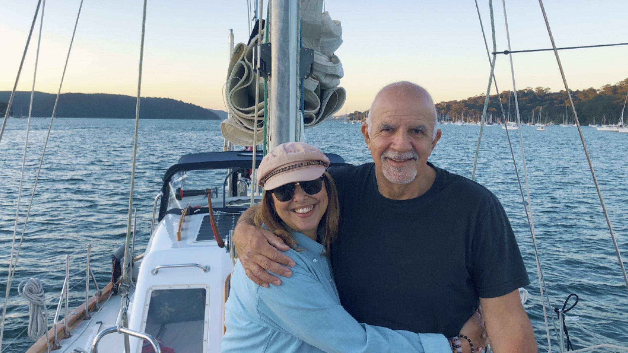 Jim on his boat, with his wife Adriana. (Source: Supplied)